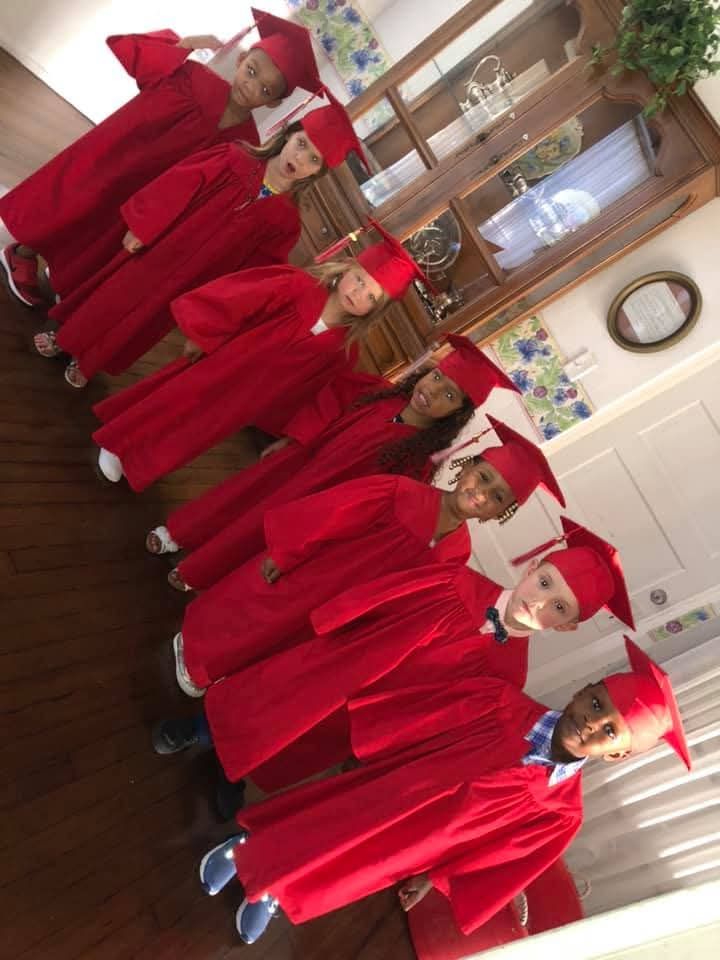VPK graduation ceremony at C.O.R.E Daycare - kids in caps and gowns